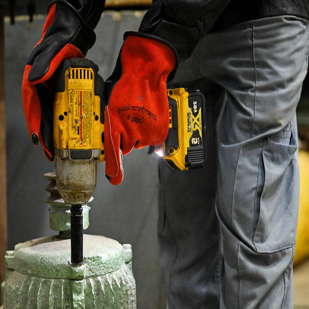 Dragon Slayer TIG Spider RM-02 gloves lifestyle shot showing flexibility during TIG welding work